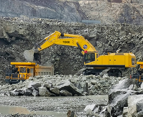 What are the key components of a large mining excavator?